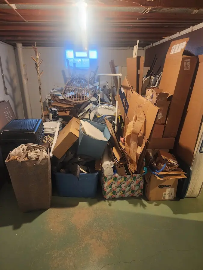 Roll-off dumpster container at job site for Roll Off Dumpster Rental in Greenwood